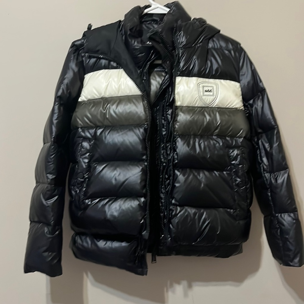 Down winter jacket in mint condition .